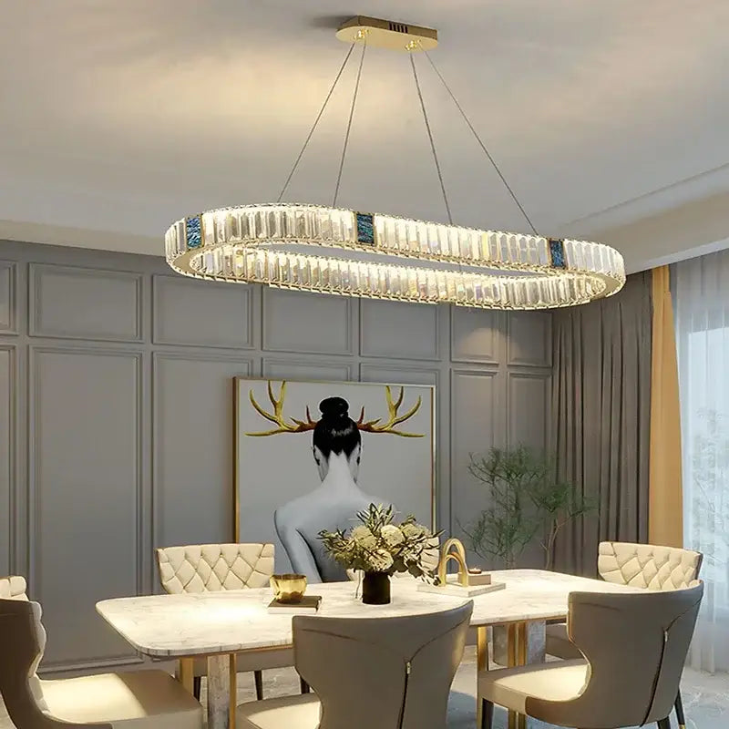 A modern gold crystal round ceiling chandelier with clear crystal segments for dining room decorbites crystal round