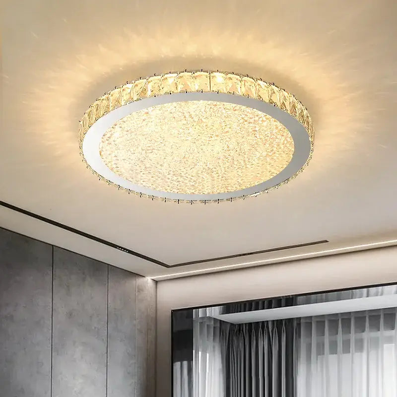 Modern gold crystal round led ceiling light with sparkling textured gold center and faceted crystal round led accents