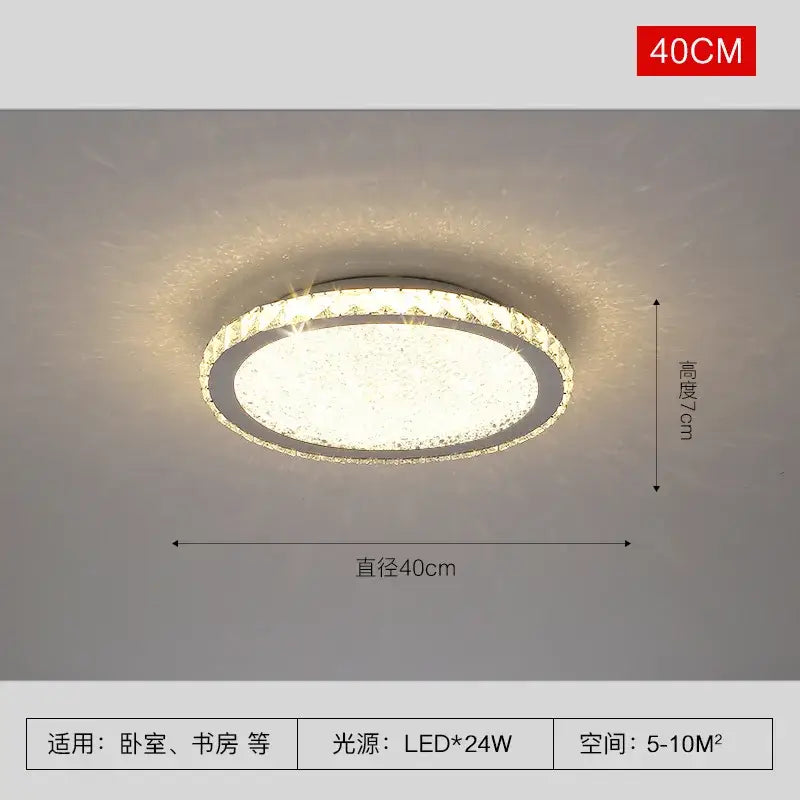 Modern gold crystal round led ceiling light with chrome frame and crystal round led accents emitting warm white light