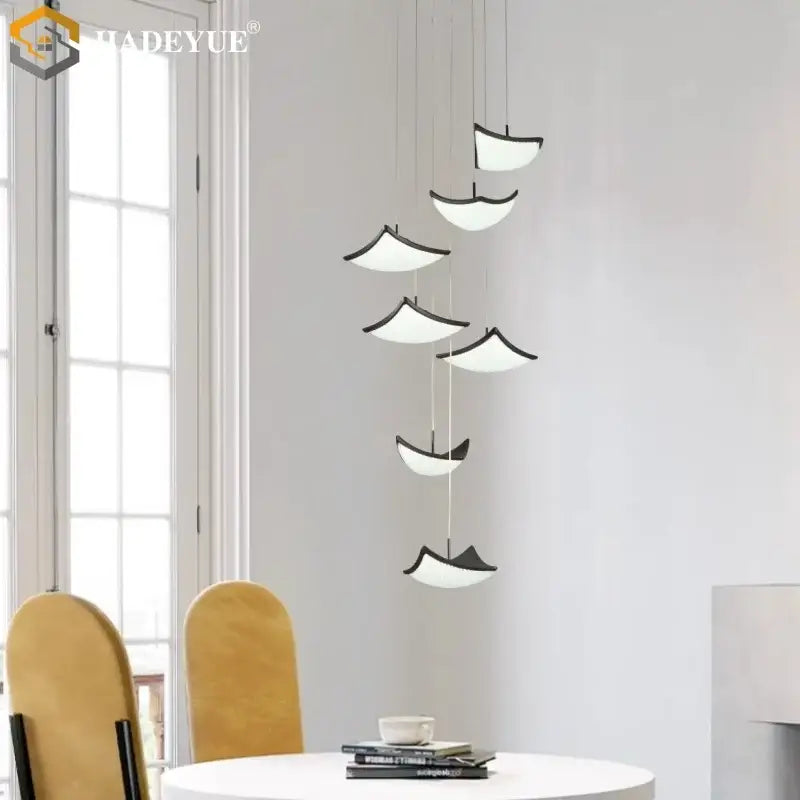Modern gold crystal sand staircase chandelier with white sail-shaped shades on thin cords for dining room decorbites crystal sand