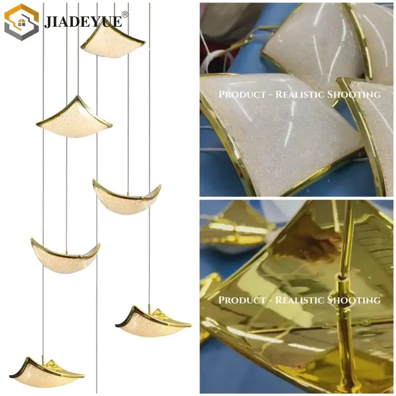 Modern gold crystal sand staircase chandelier featuring gold-finished crescent pendant lights with frosted glass centers