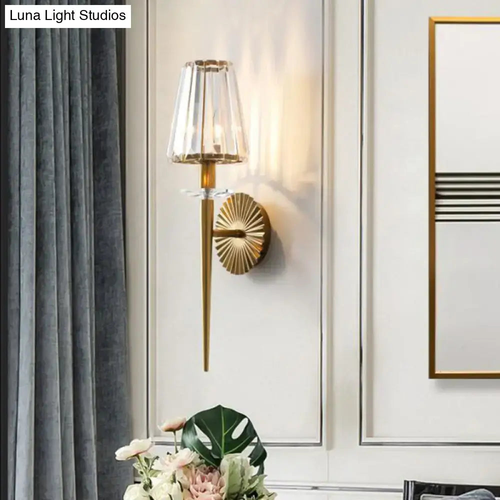 Modern gold wall light with faceted crystal shade and sunburst backplate suitable for 220v-240v and 110v-120v use