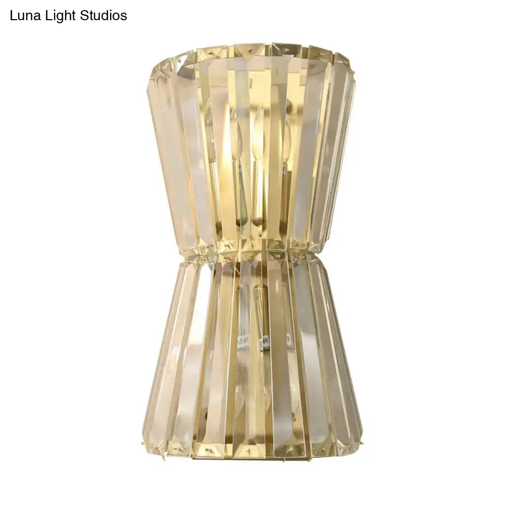 Modern gold crystal shade wall mounted light featuring vertical faceted panels for corridor sconce lighting