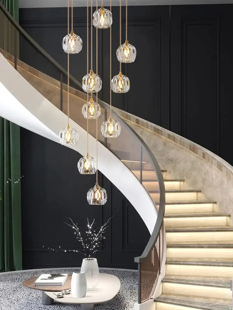 Modern gold crystal stainless steel staircase chandelier with clear faceted glass globes by decorbites crystal stainless