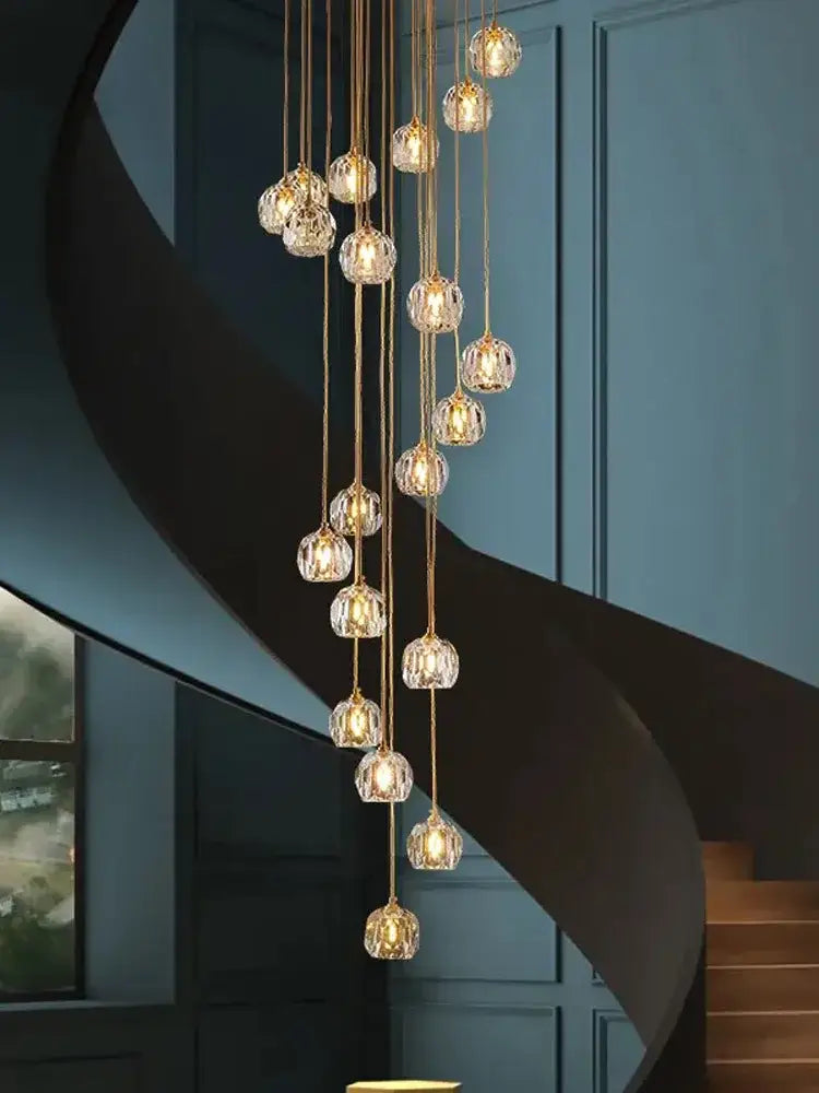 Modern gold crystal stainless steel staircase chandelier with multiple hanging crystal globe lights by decorbites crystal stainless