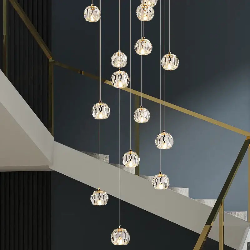 Modern gold crystal stair football shaped chandelier stairwell light with crystal globe pendant lights and gold fixtures