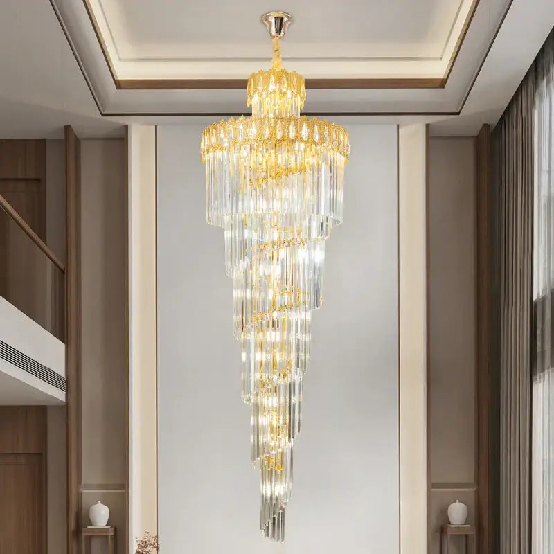 Modern gold crystal stair long chandelier with cascading clear crystal prisms and gold-toned metal accents for decorbites crystal stair decor