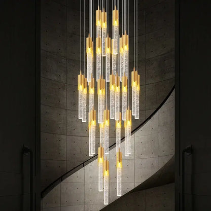Modern gold crystal staircase chandelier with clear bubble-filled glass tubes and warm led lights for stairwell decorbites crystal staircase