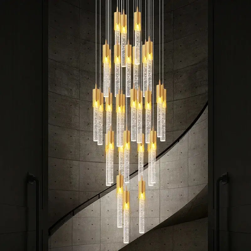 Modern gold crystal staircase chandelier with clear bubble-filled glass tubes and warm led lights for stairwell decorbites crystal staircase