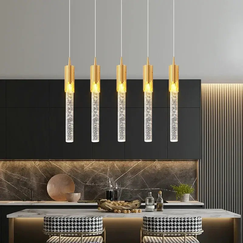 Modern gold crystal staircase chandelier with five pendant lights featuring gold finish and clear sparkling glass decorbites crystal staircase