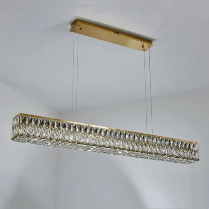 Modern gold crystal steel led pendant light featuring clear faceted crystals for elegant dining room decorbites crystal steel design