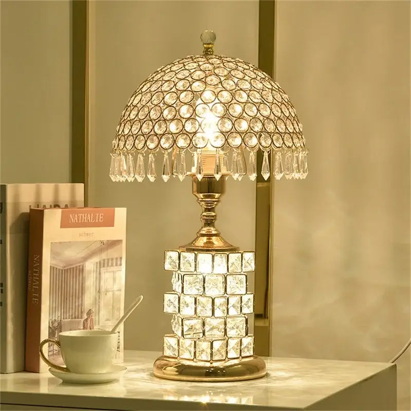 Modern gold crystal table lamp with faceted dome top, teardrop chandeliers, square base, and dimmer remote control decorbites crystal table