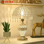 Modern gold-toned crystal table lamp with dome-shaped shade and dimmer remote control for elegant bedroom decorbites crystal table use