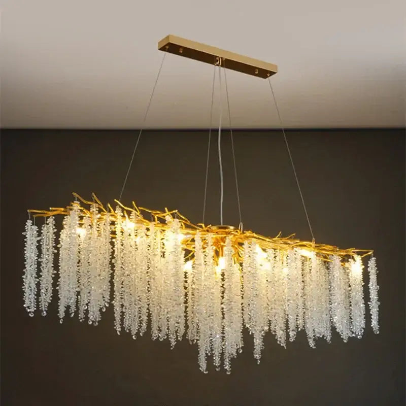 Modern gold crystal tassel led pendant light with cascading clear crystal strands resembling grapevines for dining room decorbites crystal tassel chandelier