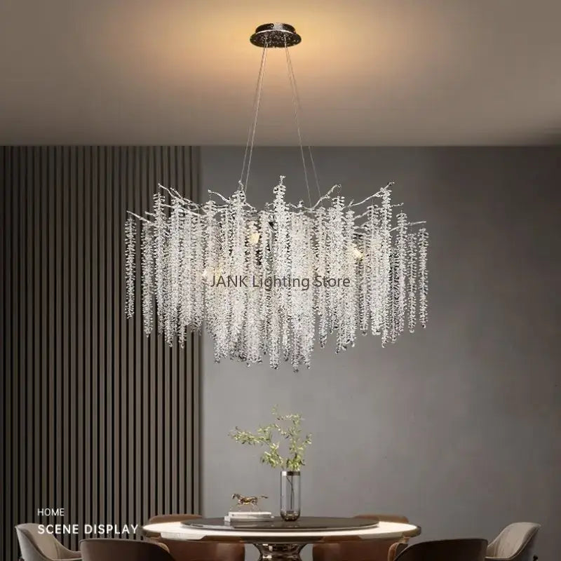 Elegant modern gold crystal tassel pendant chandelier with cascading clear faceted crystals in polished chrome mount