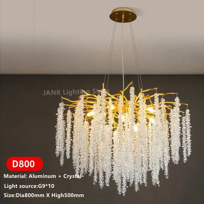 Modern gold crystal tassel pendant chandelier featuring a golden branch design with cascading clear crystal strands for dining room decorbites crystal tassel lighting