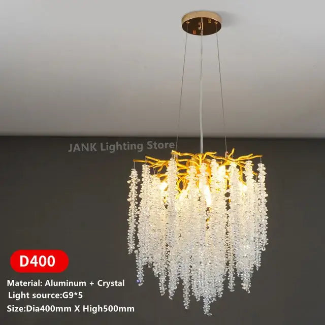 Modern gold crystal tassel pendant chandelier with golden branch design and cascading clear crystal droplets for dining room lighting