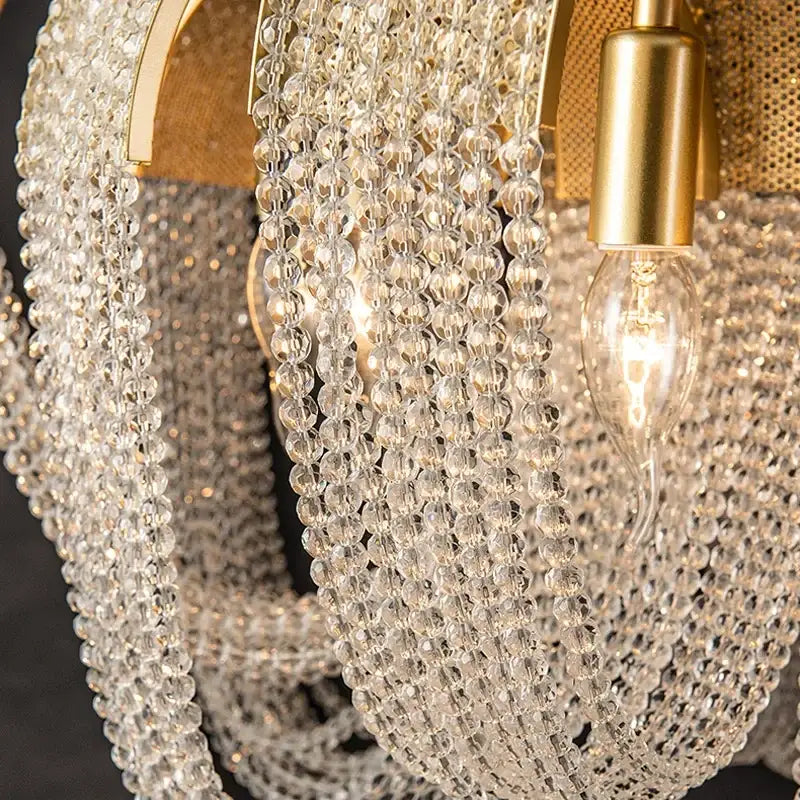 Modern gold crystal tassels led chandelier with cascading clear faceted beads and warm brass finish for dining room decorbites crystal tassels