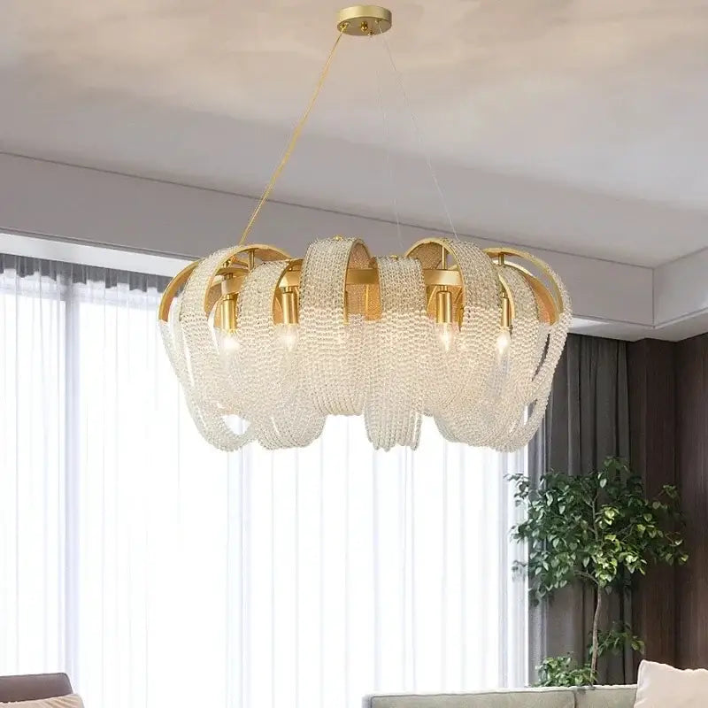 Modern gold crystal tassels led chandelier with cascading crystal tassels and circular metallic frames for dining room decorbites