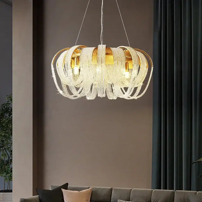 Modern gold crystal tassels led chandelier featuring cascading clear crystal tassels for dining room decorbites decor