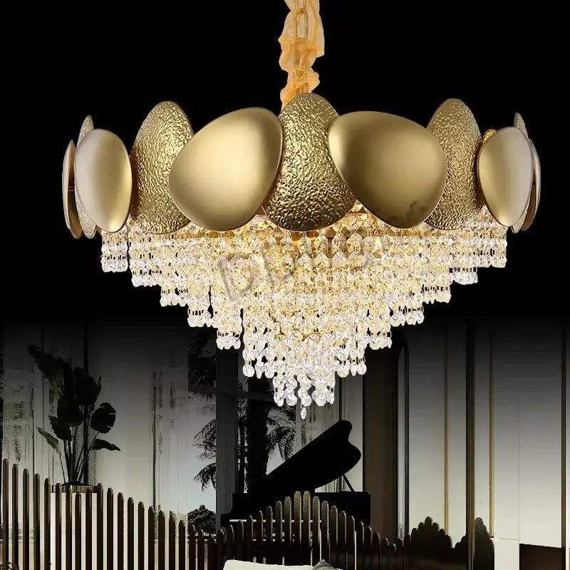 Modern gold pendant chandelier featuring textured metallic orbs and decorbites crystal tassles led for living room decor