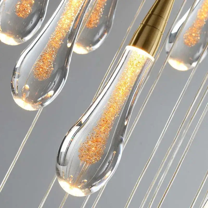 Modern gold crystal tear drop led pendant light with clear glass and golden glitter for dining room decorbites crystal tear