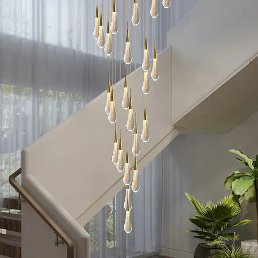 Modern gold crystal teardrop chandelier with illuminated glass pendants for staircase and living room decorbites crystal teardrop
