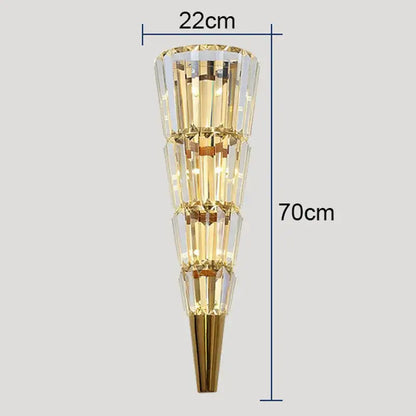 Modern gold crystal torch wall lamp with tiered crystal facets emitting warm glow for elegant living room decorbites wall lamp