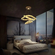 Modern gold crystal triangle chandelier with intertwined ring design in decorbites crystal triangle style for living room decor