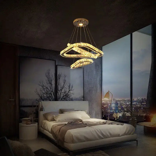 Modern gold crystal triangle chandelier with intertwined ring design in decorbites crystal triangle style for living room decor