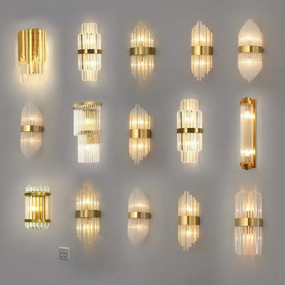 Modern gold crystal wall lamp with clear glass prisms in vertical stacks emitting warm light for decorbites crystal wall use