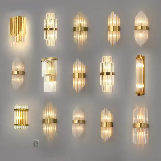 Modern gold crystal wall lamp with clear glass prisms in vertical stacks emitting warm light for decorbites crystal wall use