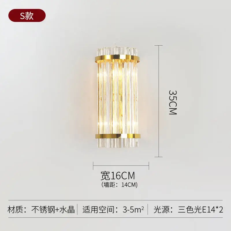 Modern gold crystal wall lamp with vertical crystal rods and stainless steel accents for elegant bedroom decorbites crystal wall lighting