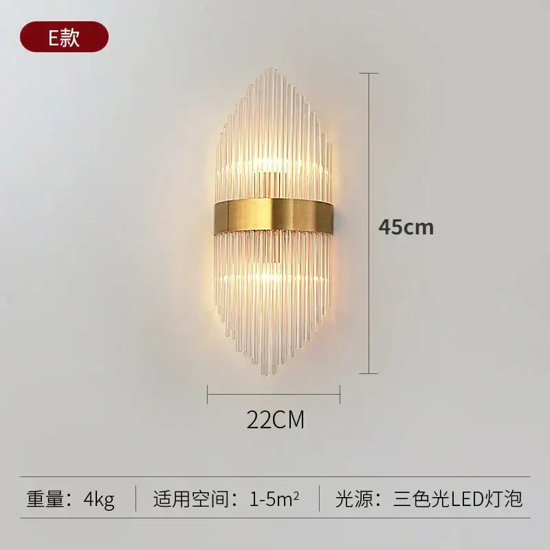 Modern gold crystal wall lamp with vertical glass rods and three-color led lighting decorbites crystal wall sconce
