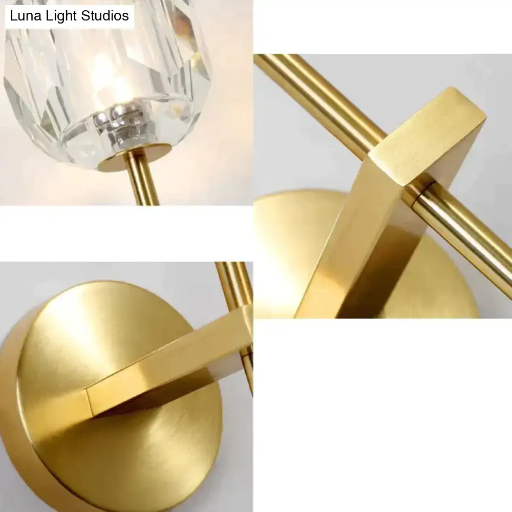 DecorBites™ Ivy crystal wall lamp with faceted globe and brushed brass rods on a circular base wall lamp