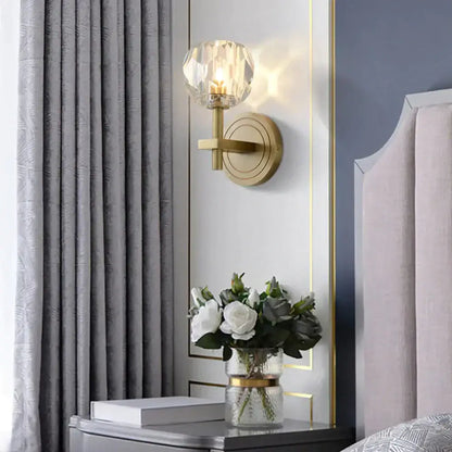 Gold-toned decorbites ivy wall lamp with faceted crystal globe shade elegant crystal wall lamp design