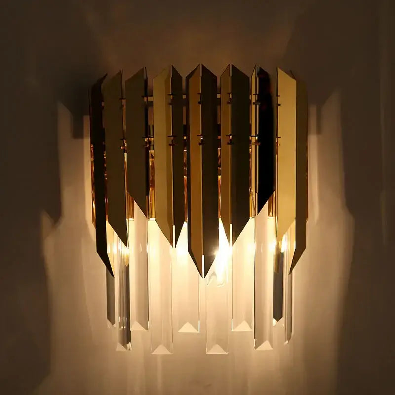 Modern gold crystal wall lamp featuring vertical mirrored and crystal prisms for elegant bedroom decorbites crystal wall decor