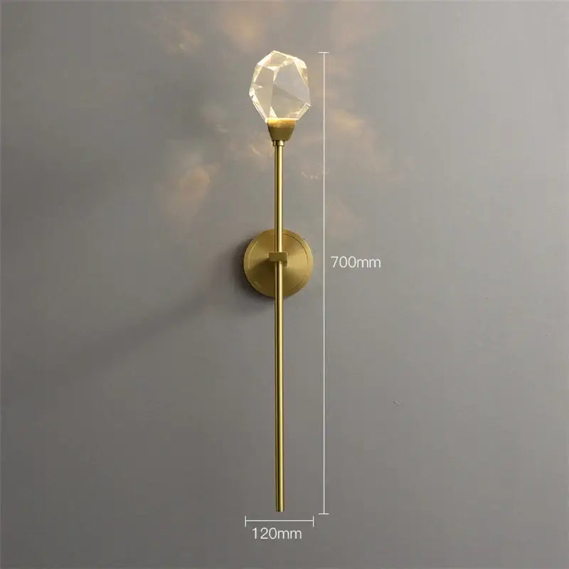 Modern gold crystal wall lamp featuring a slender led sconce with a faceted crystal bulb for elegant decorbites crystal wall lighting