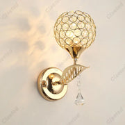 Modern gold crystal wall lamp with spherical crystal globe and dangling clear teardrop for bedroom decorbites crystal wall