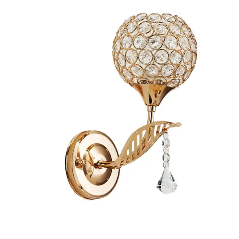 Modern gold crystal wall lamp with spherical globe and dangling teardrop crystal for elegant bedroom decorbites crystal wall lamp