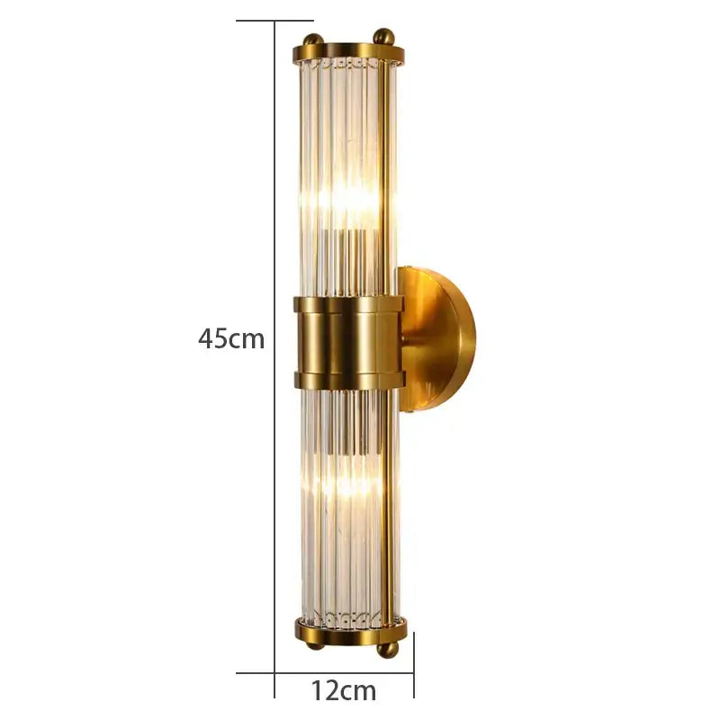 A sleek 45cm tall modern gold crystal wall lamp with brushed gold finish and vertical ribbed glass panels for bedroom decorbites crystal wall