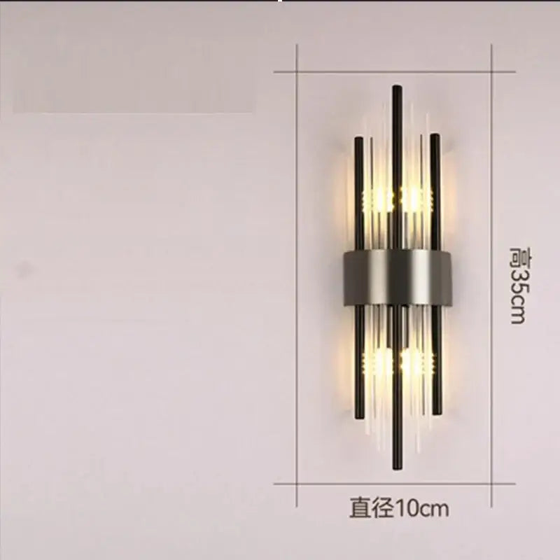 Modern gold crystal wall lamp with brushed metal base and vertical glass rods warm light for bedroom decorbites crystal wall lamp