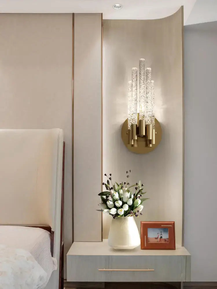 Modern gold crystal wall lamp with multiple vertical crystal rods for stylish living room decorbites crystal wall lighting