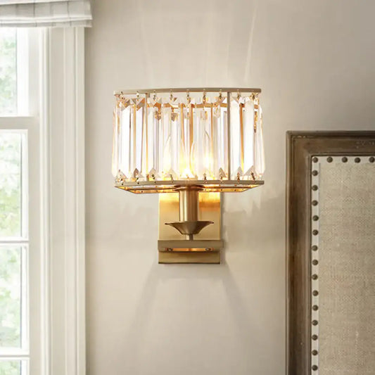 Gold-toned modern wall lamp with vertical crystal prisms and rectangular frame for 110v-120v and 220v-240v use