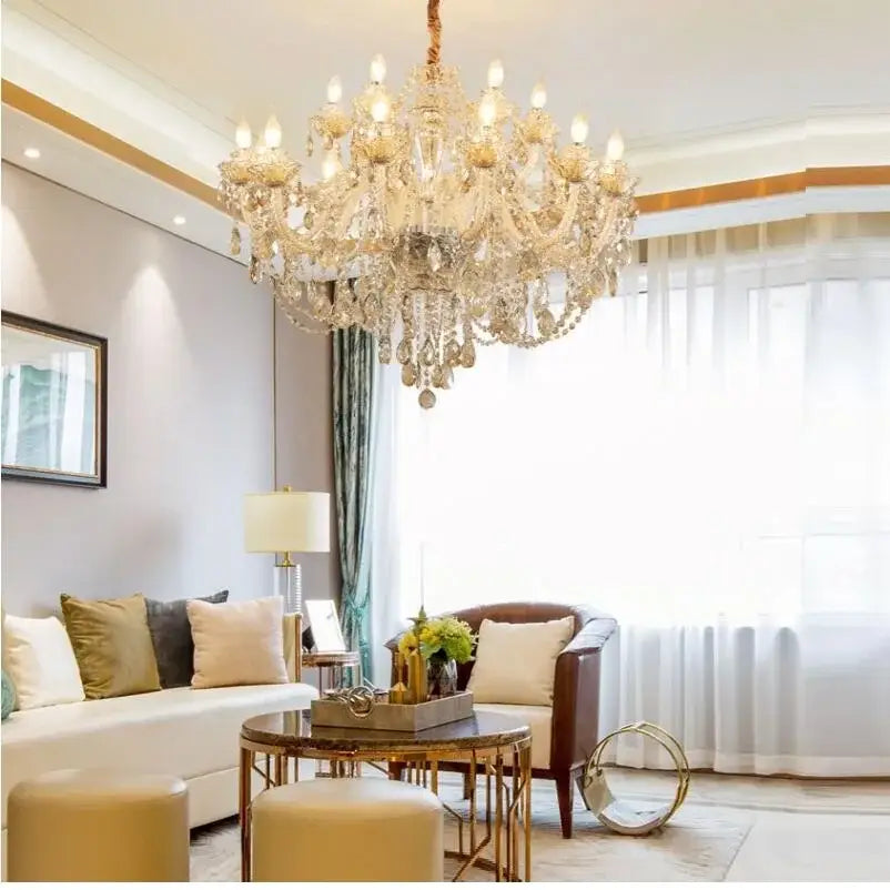 A luxurious modern gold decorbites crystal chandelier with multiple tiers of hanging crystals for living room decor