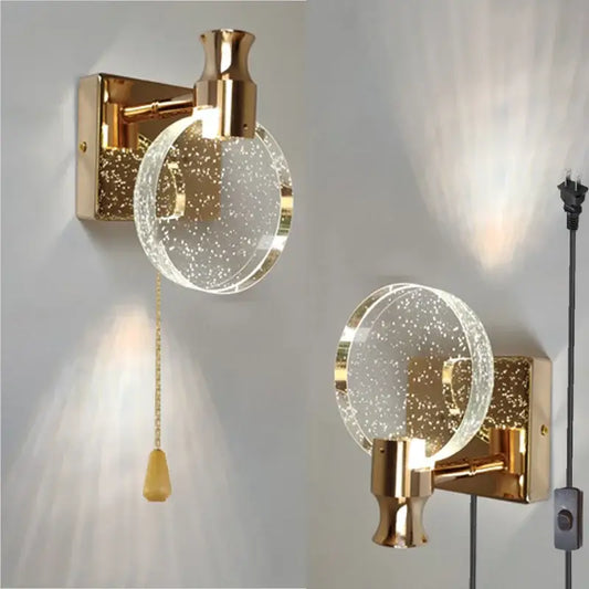 Modern gold crystal wall lamp with clear glass globe filled with sparkling particles for elegant decorbites crystal wall lighting