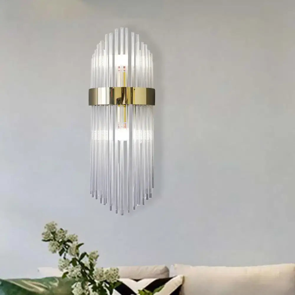 Modern gold crystal wall lamp with clear glass rods and metallic frame for elegant living room lighting