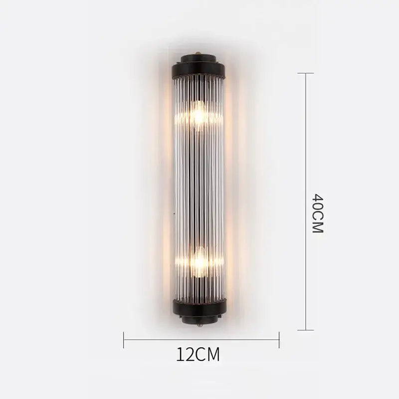 Modern gold crystal wall lamp with a black metal frame and vertical glass rods emitting warm light for living room