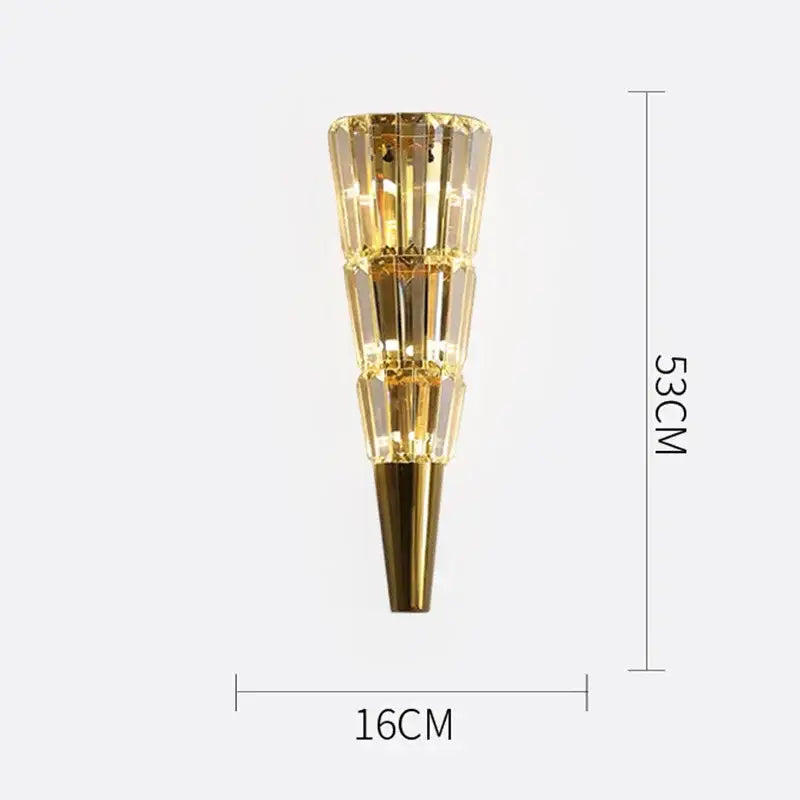 A sleek 53cm tall modern gold crystal wall lamp with faceted segments for living room illumination