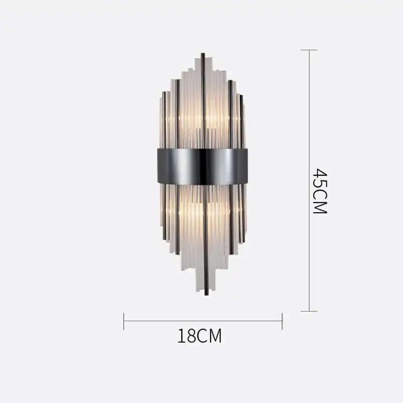 Modern gold crystal wall lamp with metallic frame and vertical glass rods emitting warm light for living room wall lamp